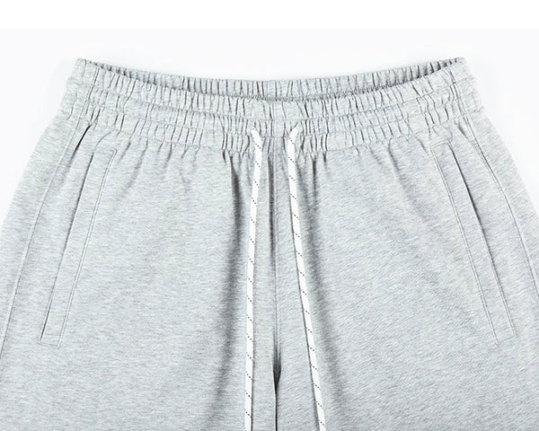 IDLT sweat shorts, heather gray waistband.