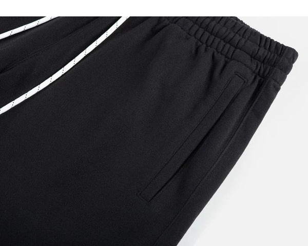 IDLT sweat shorts, black side pocket.