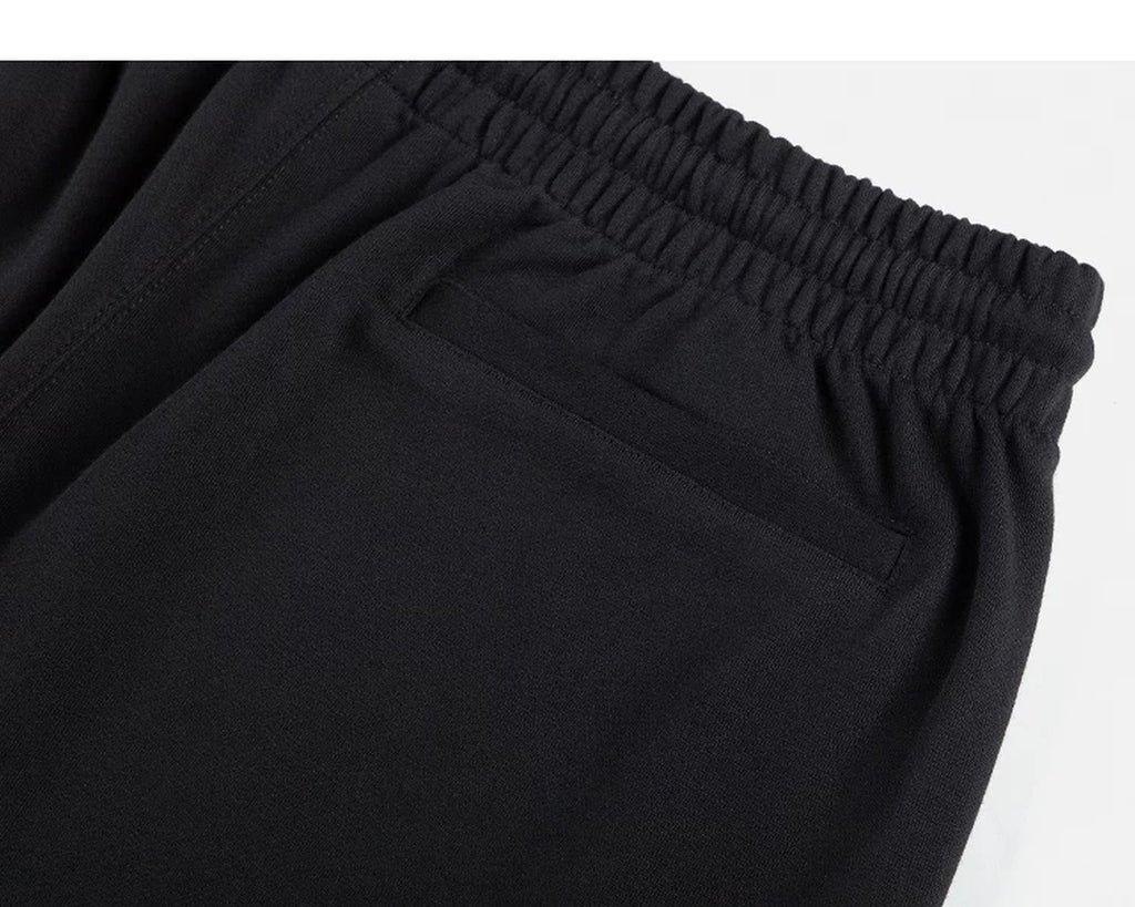 IDLT sweat shorts, black back pocket.