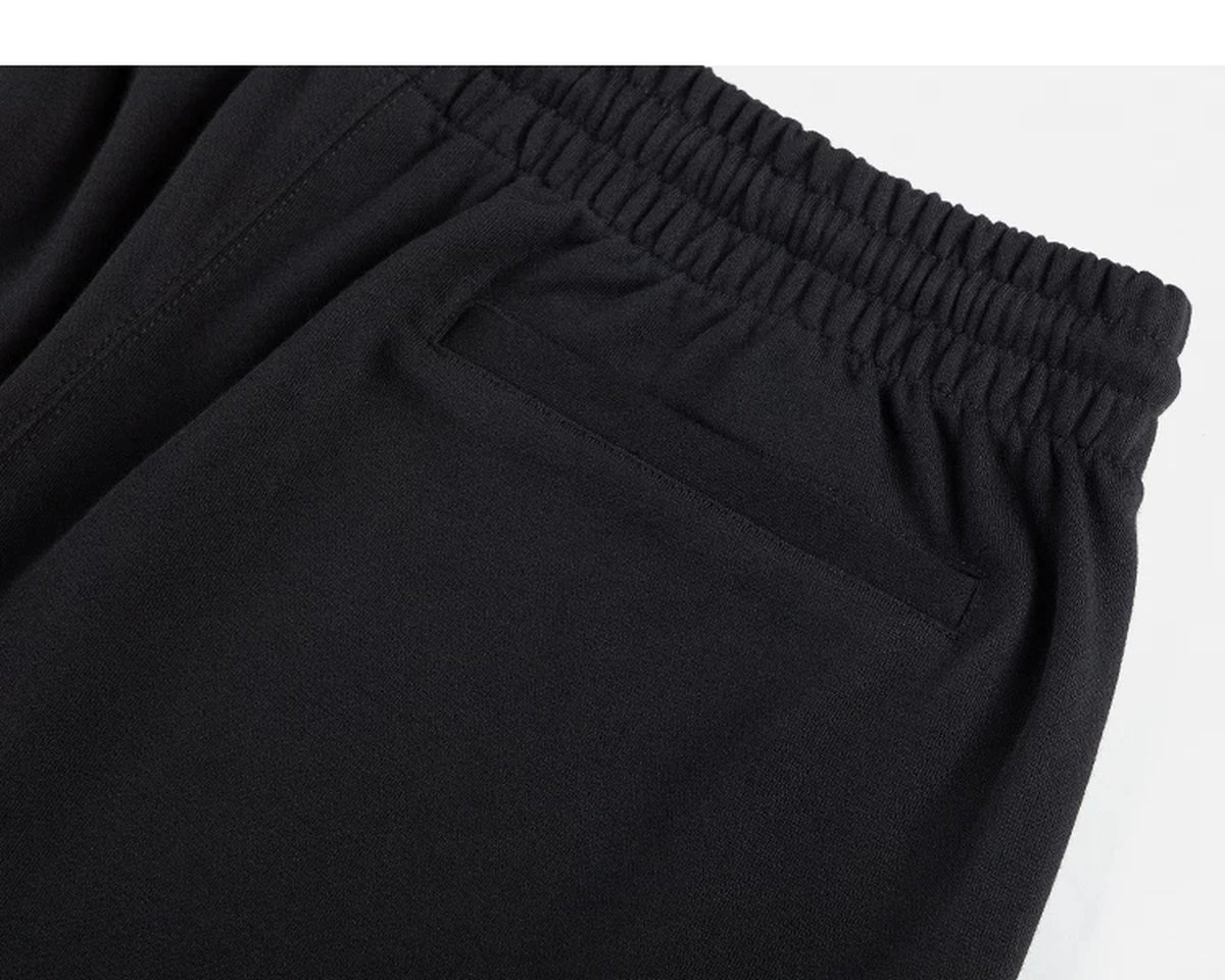 IDLT sweat shorts, black back pocket.