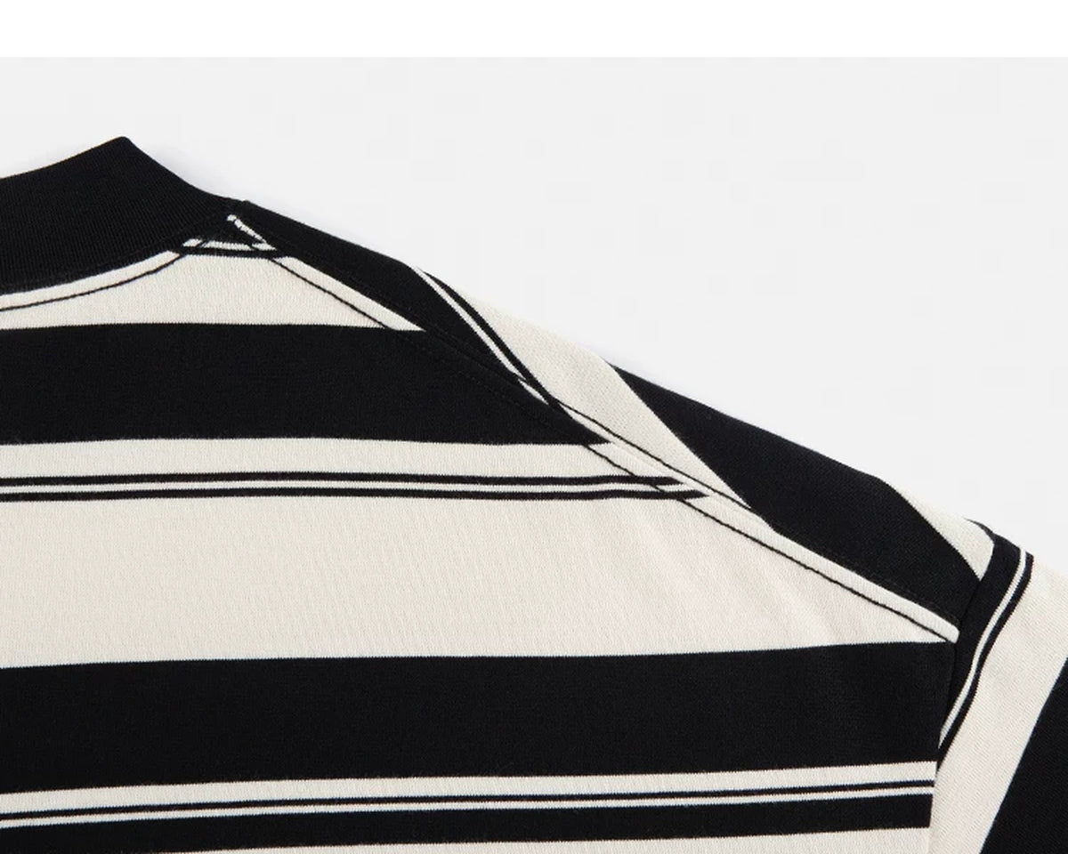 IDLT striped T-shirt, black and cream shoulder seam.