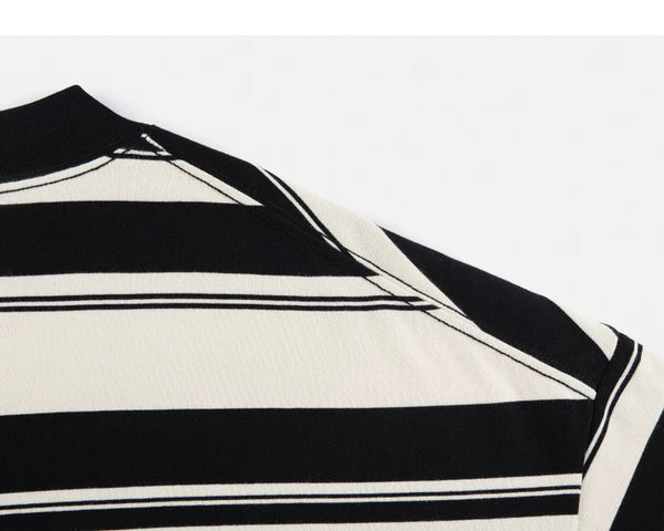 IDLT striped T-shirt, black and cream shoulder seam.