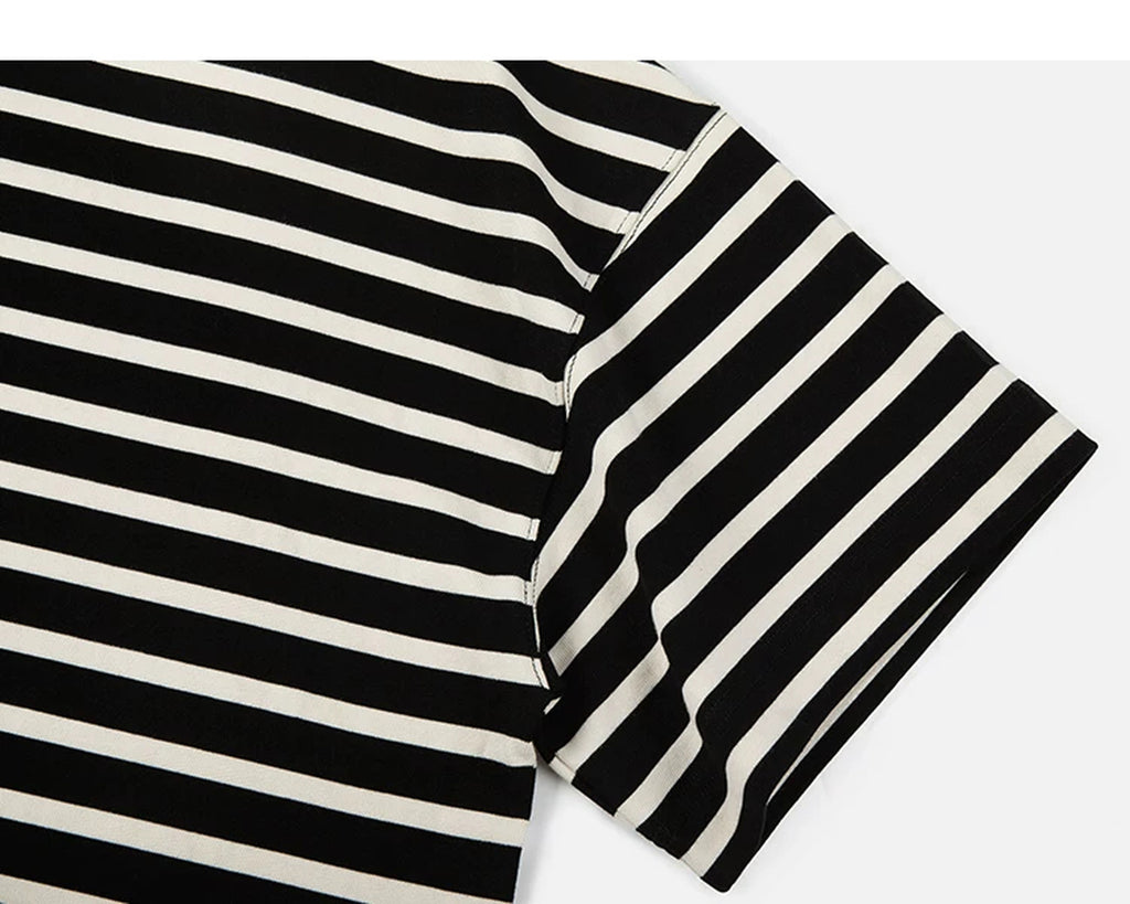 IDLT striped T-shirt, black and cream sleeve.