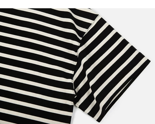 IDLT striped T-shirt, black and cream sleeve.