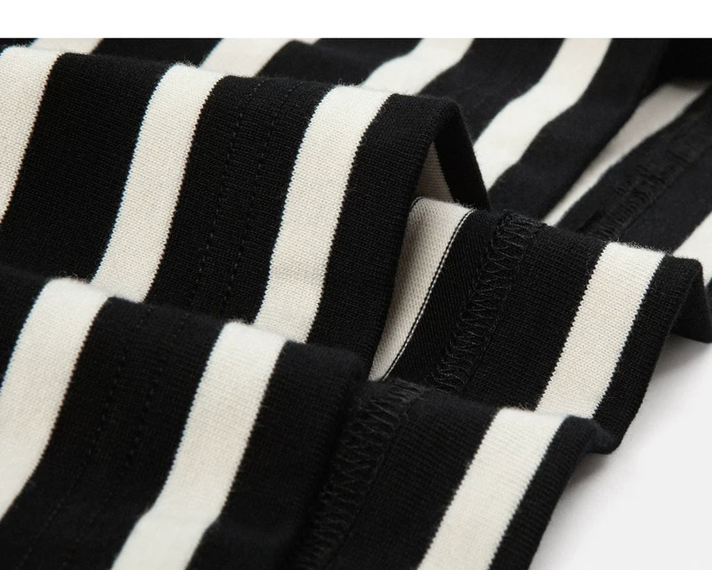 IDLT striped T-shirt, black and cream hem stitching and fabric.