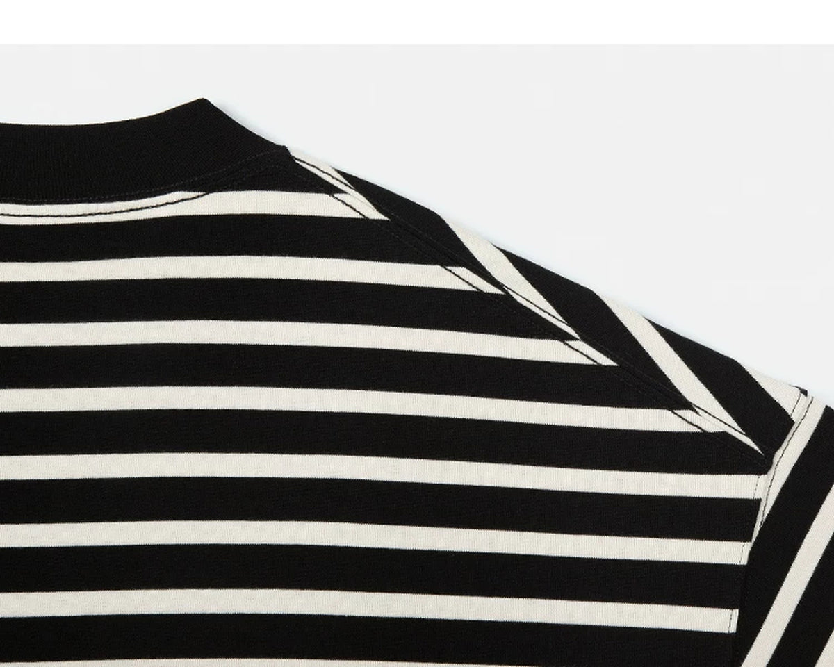 IDLT striped T-shirt, black and cream shoulder seam.