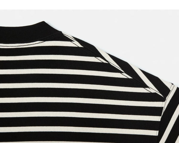 IDLT striped T-shirt, black and cream shoulder seam.