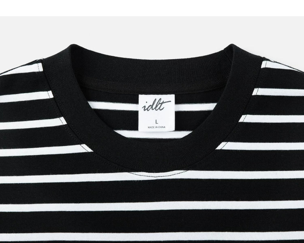 IDLT striped T-shirt, black crewneck.