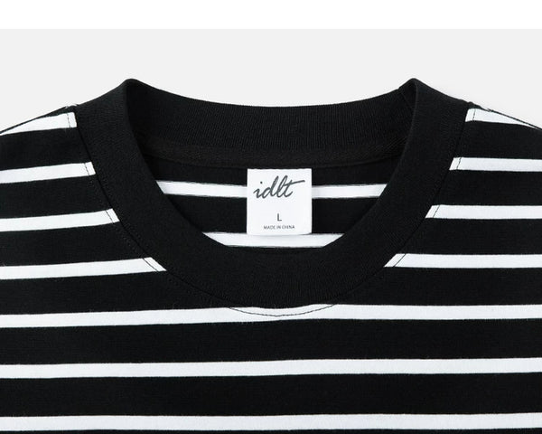 IDLT striped T-shirt, black crewneck.