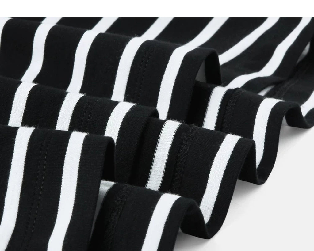IDLT striped T-shirt, black fabric folds.