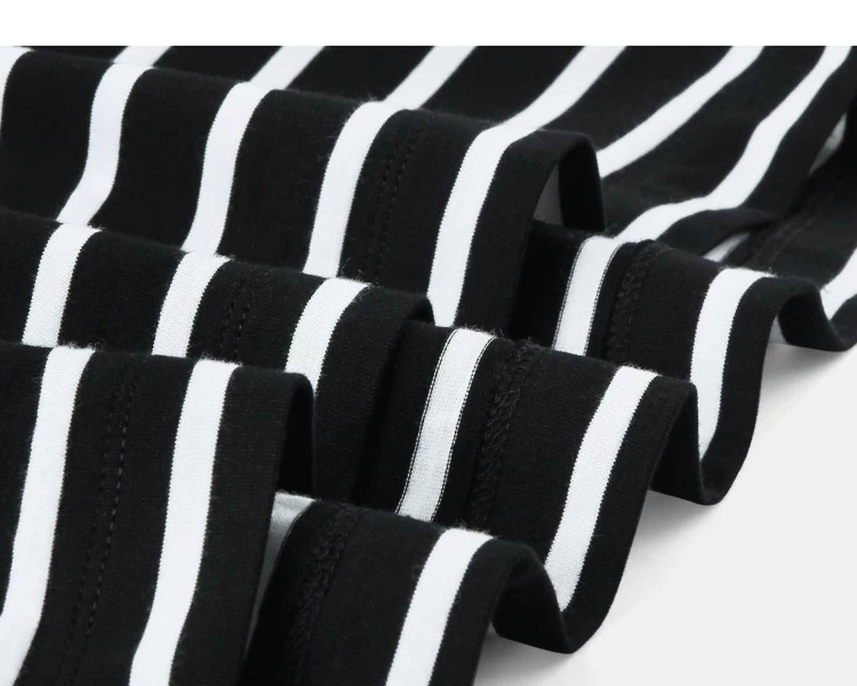 IDLT striped T-shirt, black fabric folds.