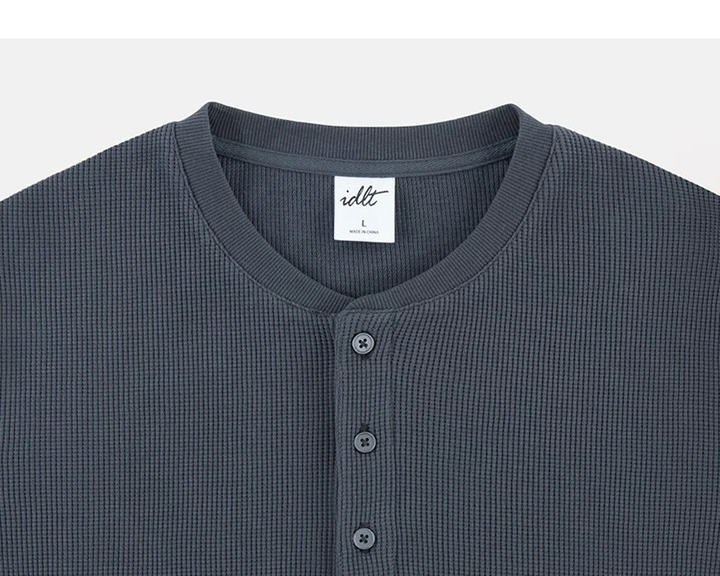 IDLT waffle henley, dark gray neckline.