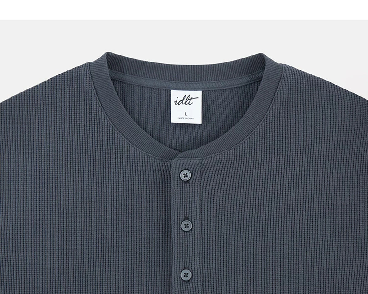 IDLT waffle henley, dark gray neckline.