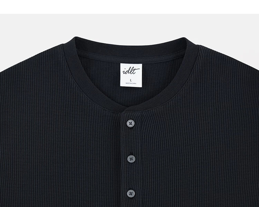 IDLT waffle henley, black neckline.