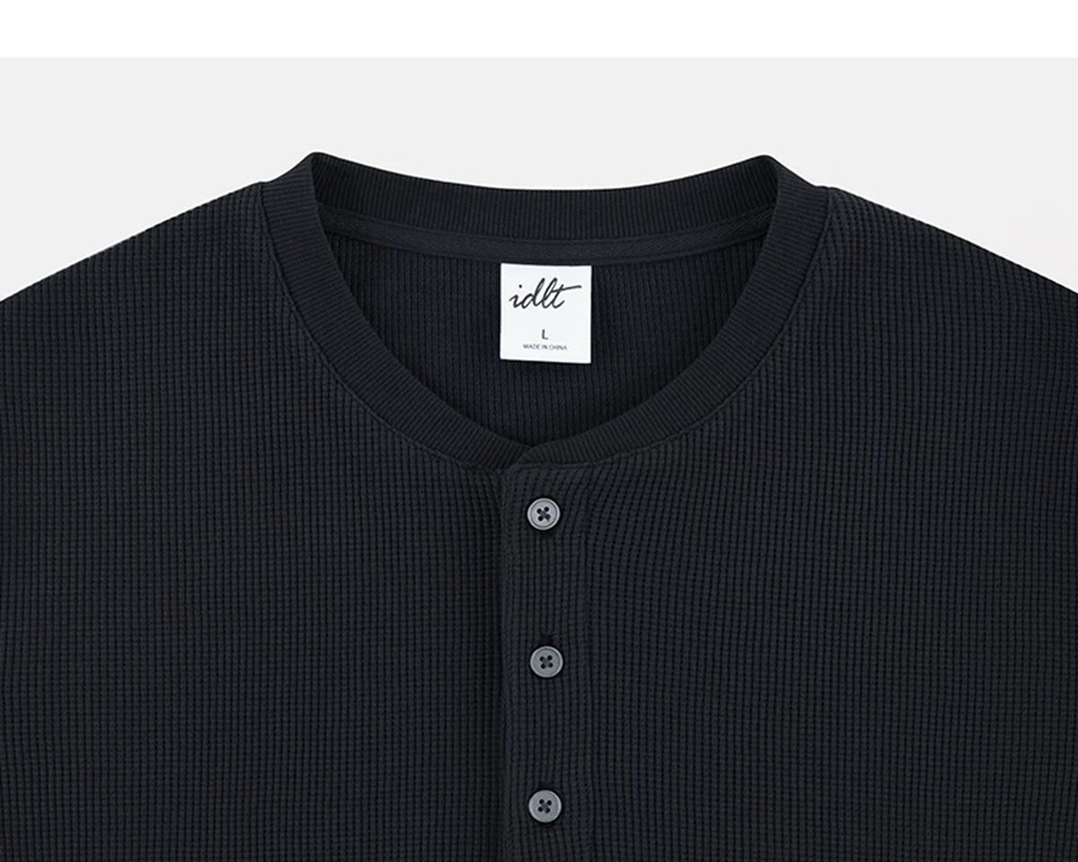 IDLT waffle henley, black neckline.