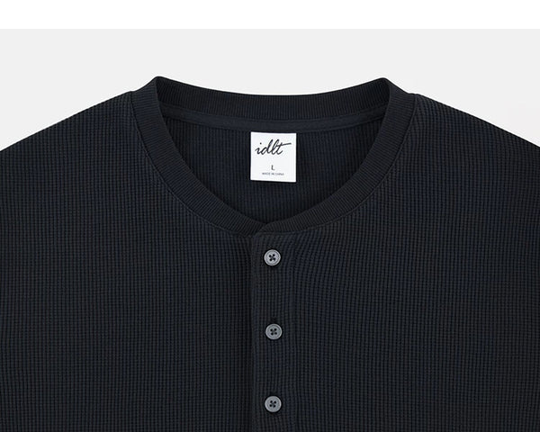 IDLT waffle henley, black neckline.