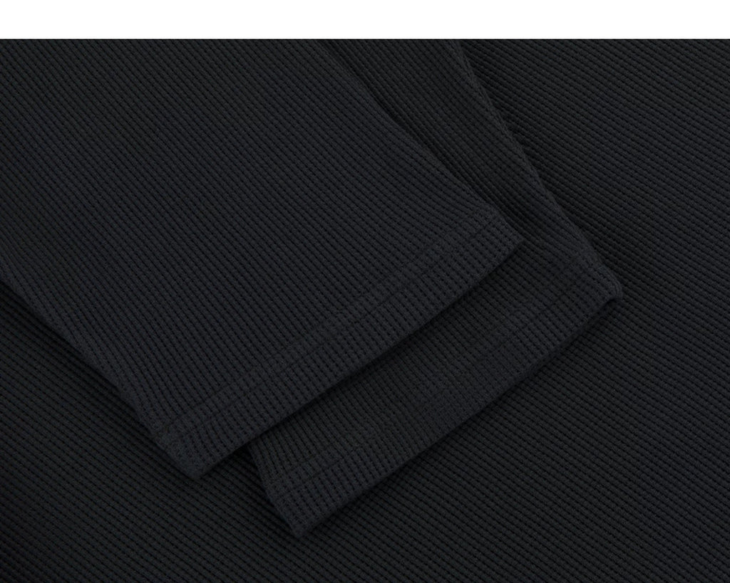 IDLT layered look waffle top, black cuffs.
