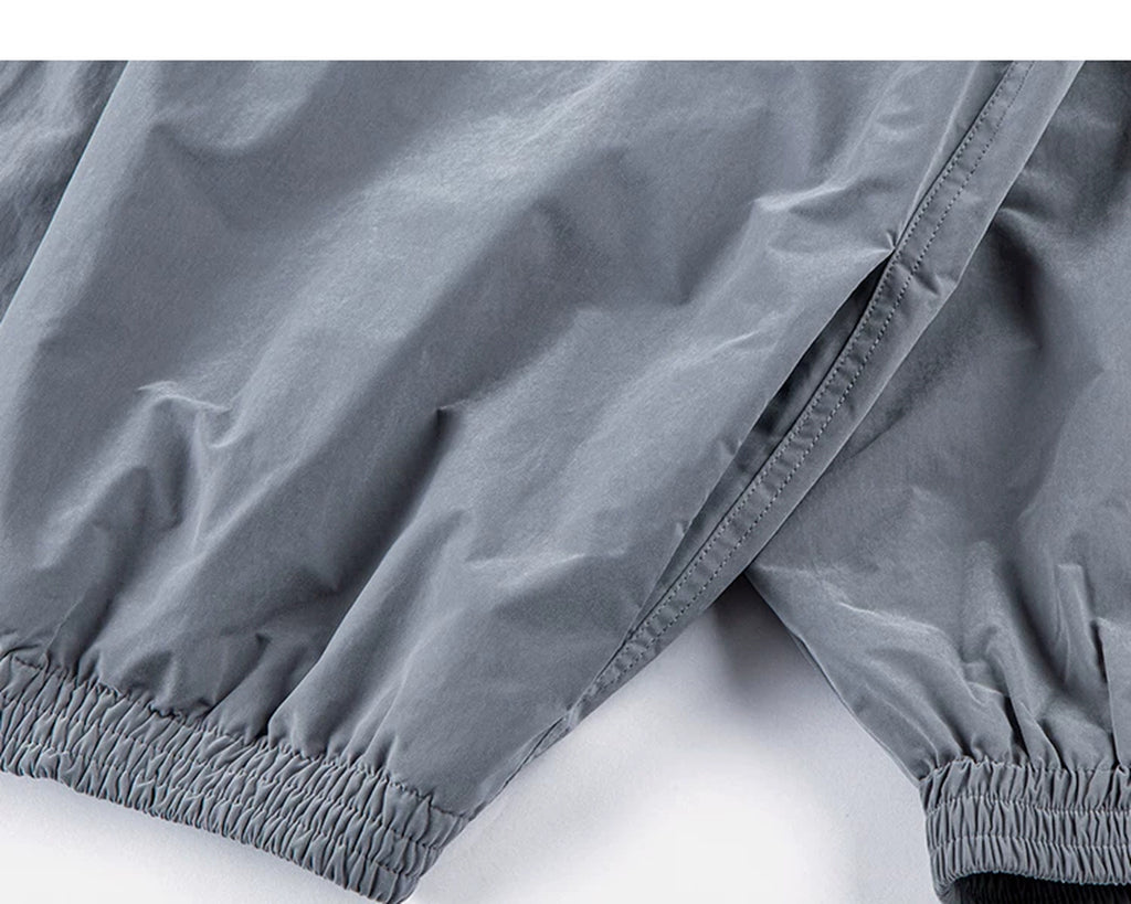 IDLT zip jacket, gray elastic cuffs.