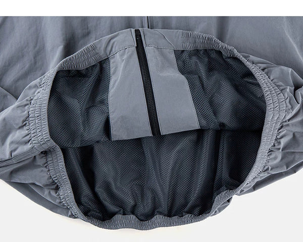 IDLT zip jacket, gray inner mesh lining.
