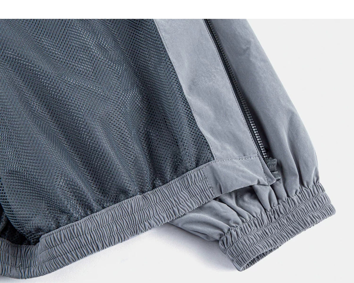 IDLT zip jacket, gray inner hem and zipper.