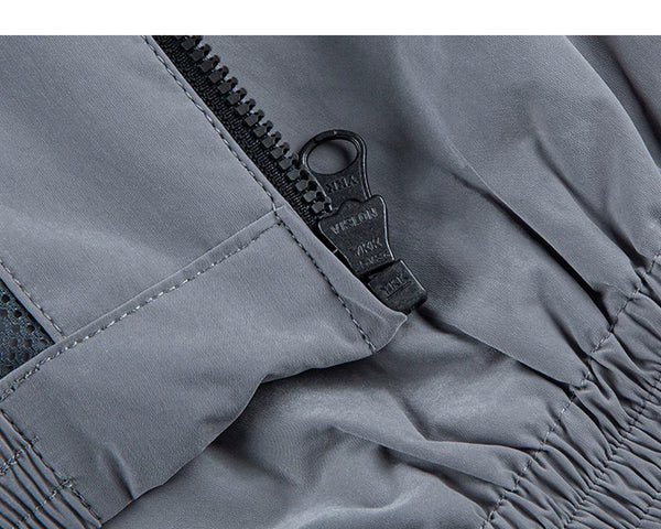 IDLT zip jacket, gray zipper pull.