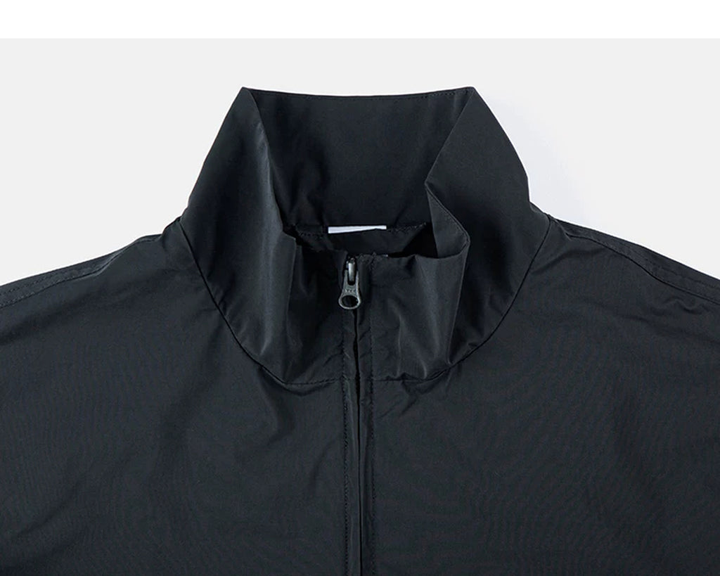 IDLT zip jacket, black stand collar.