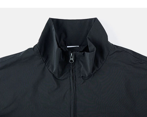 IDLT zip jacket, black stand collar.