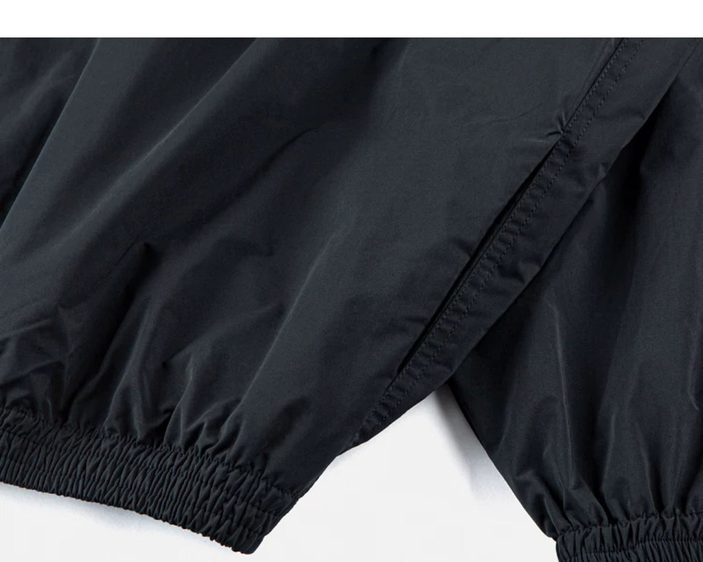 IDLT zip jacket, black elastic cuffs.