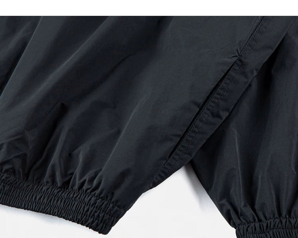 IDLT zip jacket, black elastic cuffs.