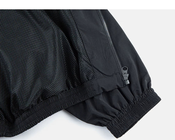 IDLT zip jacket, black inner hem and zipper.