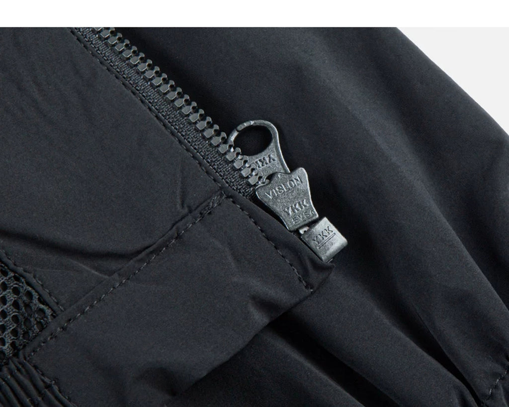 IDLT zip jacket, black zipper pull.