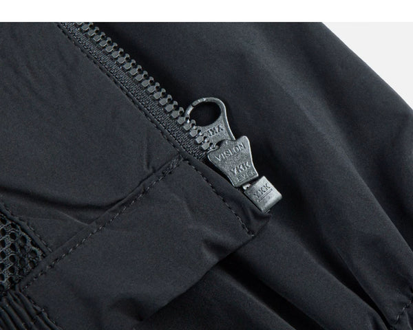 IDLT zip jacket, black zipper pull.