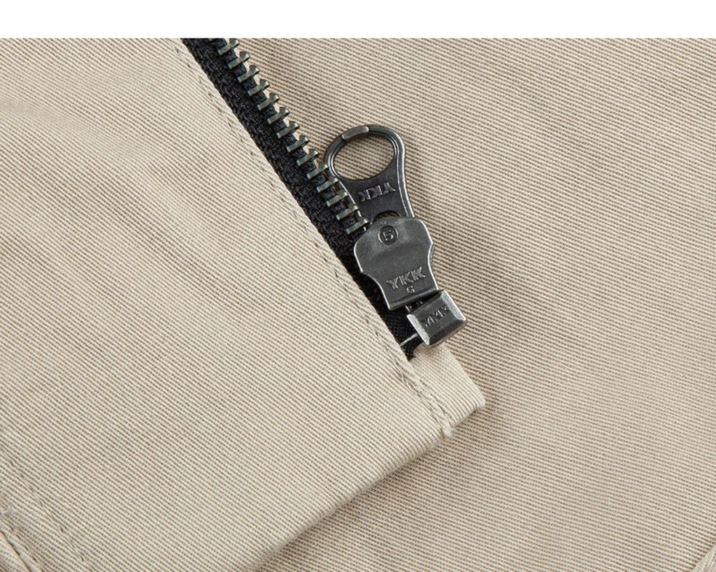 IDLT zip jacket, beige zipper pull.