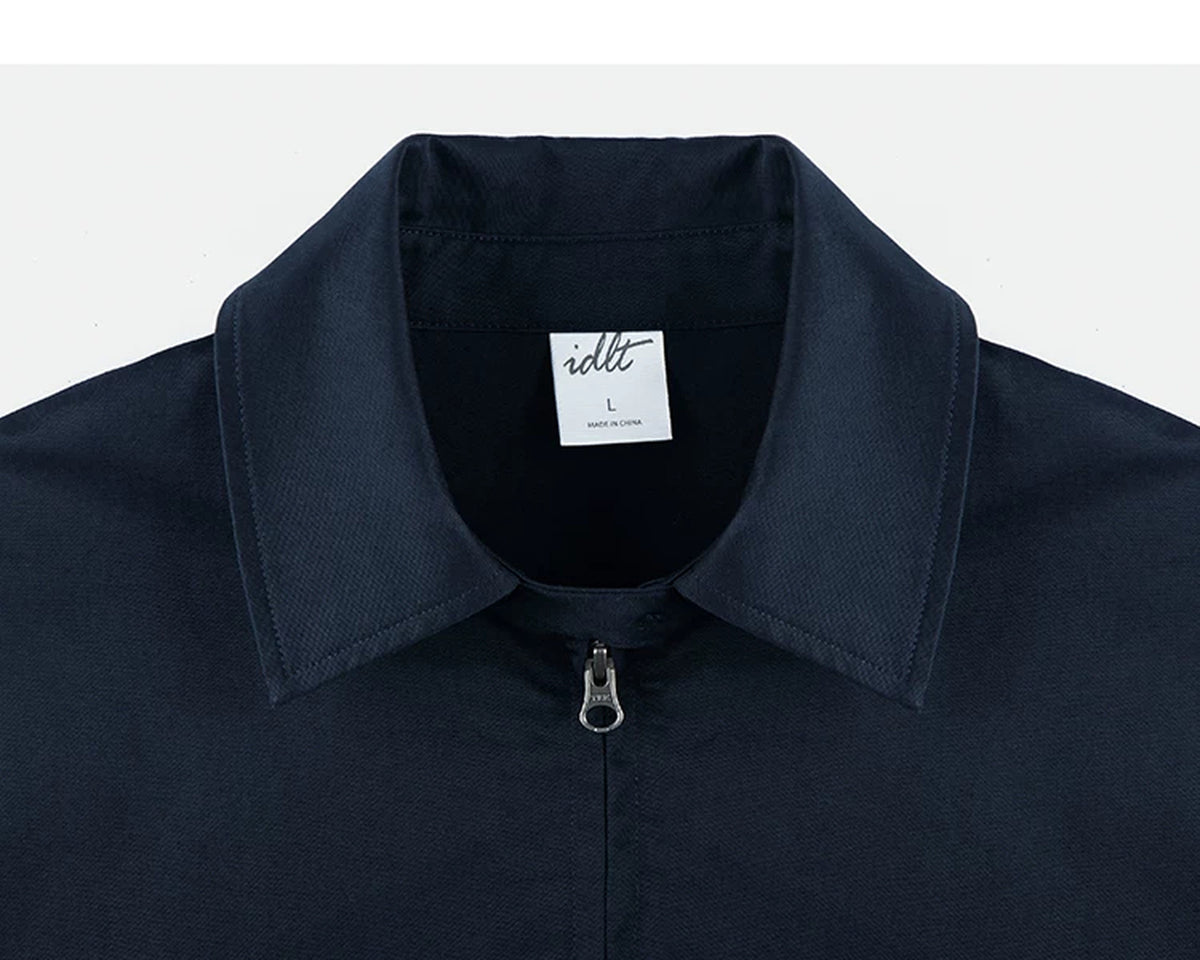 IDLT zip jacket, navy collar.