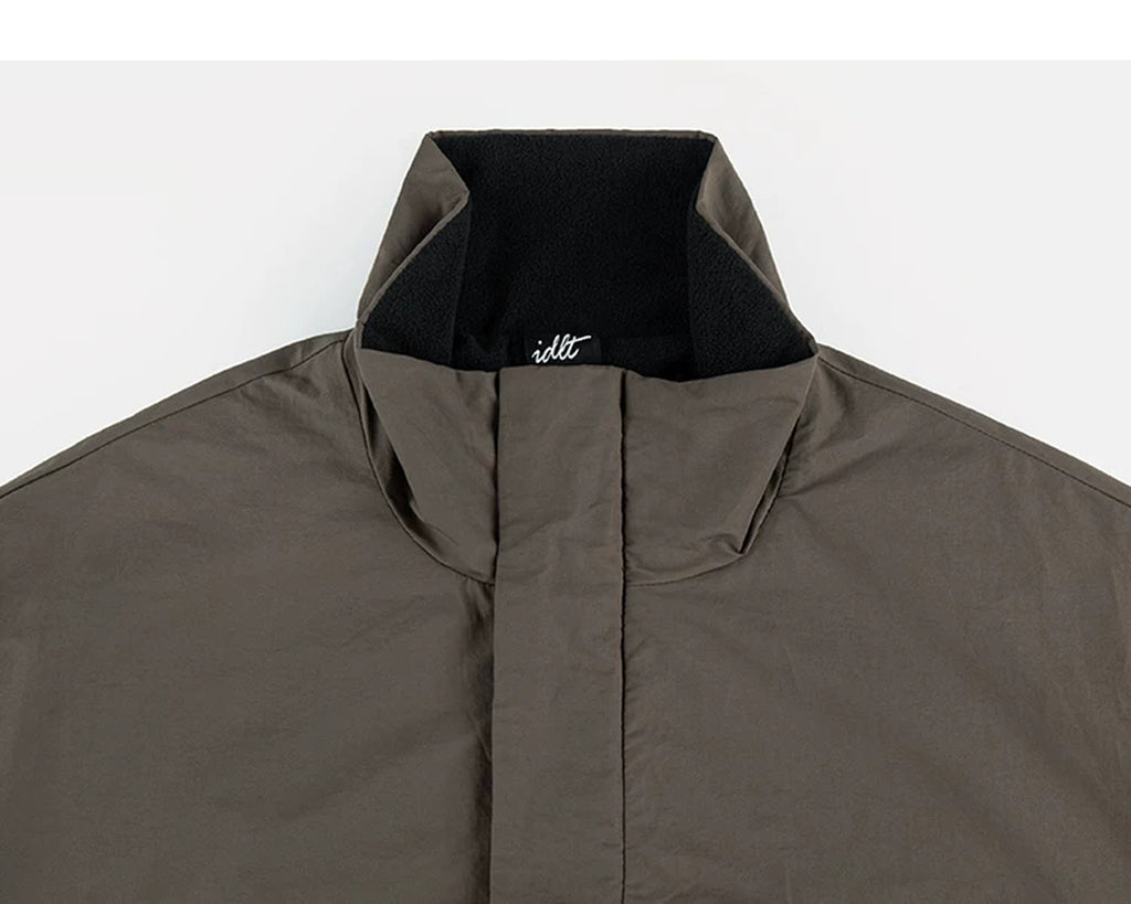 IDLT lined jacket, brown stand collar.