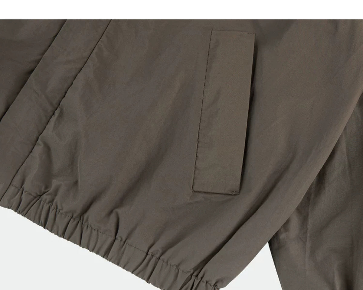 IDLT lined jacket, brown side pocket.