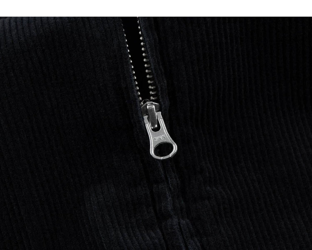 IDLT corduroy jacket, black zipper pull.
