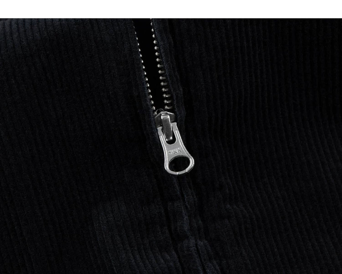 IDLT corduroy jacket, black zipper pull.