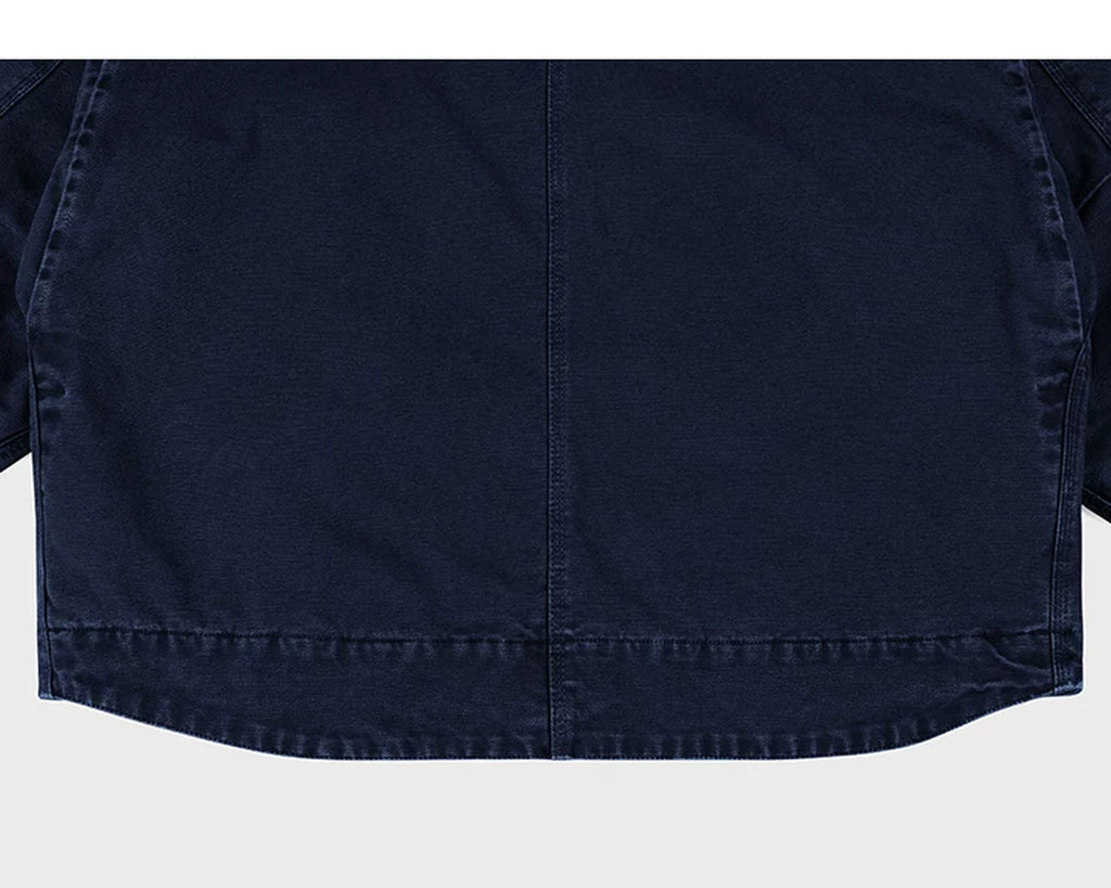 IDLT work jacket, navy curved back hem.