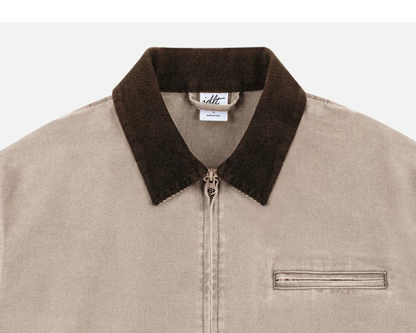 IDLT work jacket, beige collar and chest pocket.