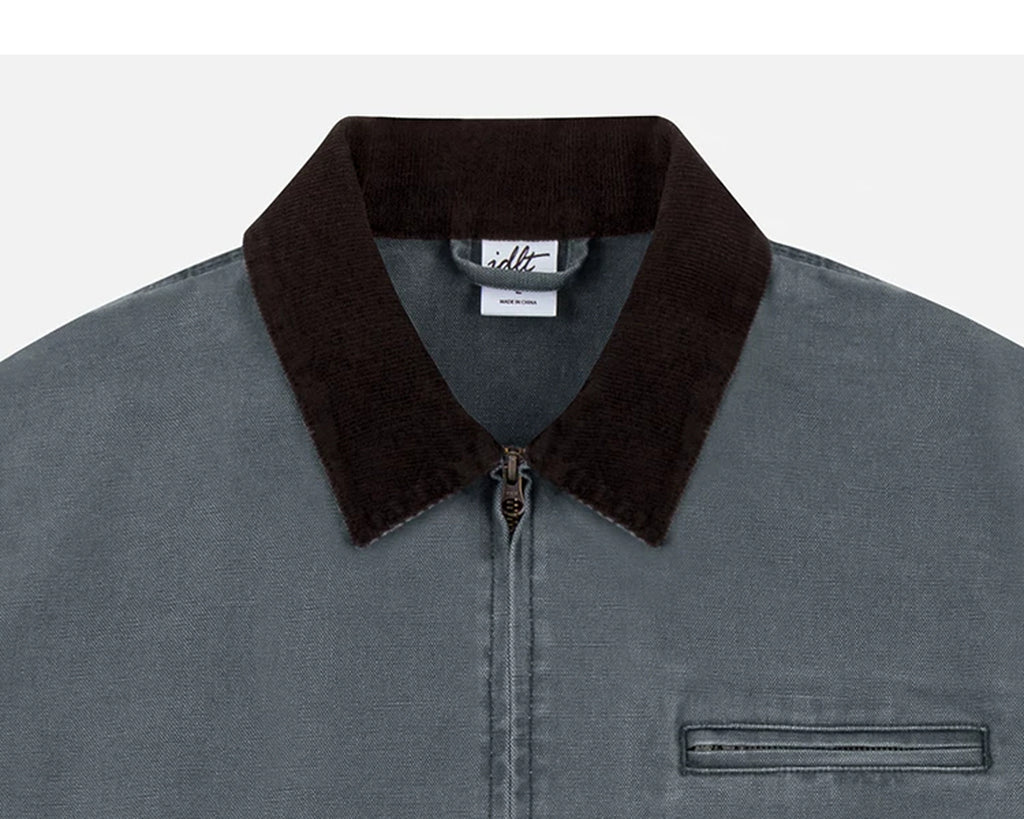 IDLT work jacket, blue gray collar and chest pocket.