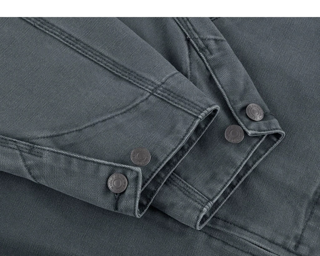 IDLT work jacket, blue gray buttoned cuffs.