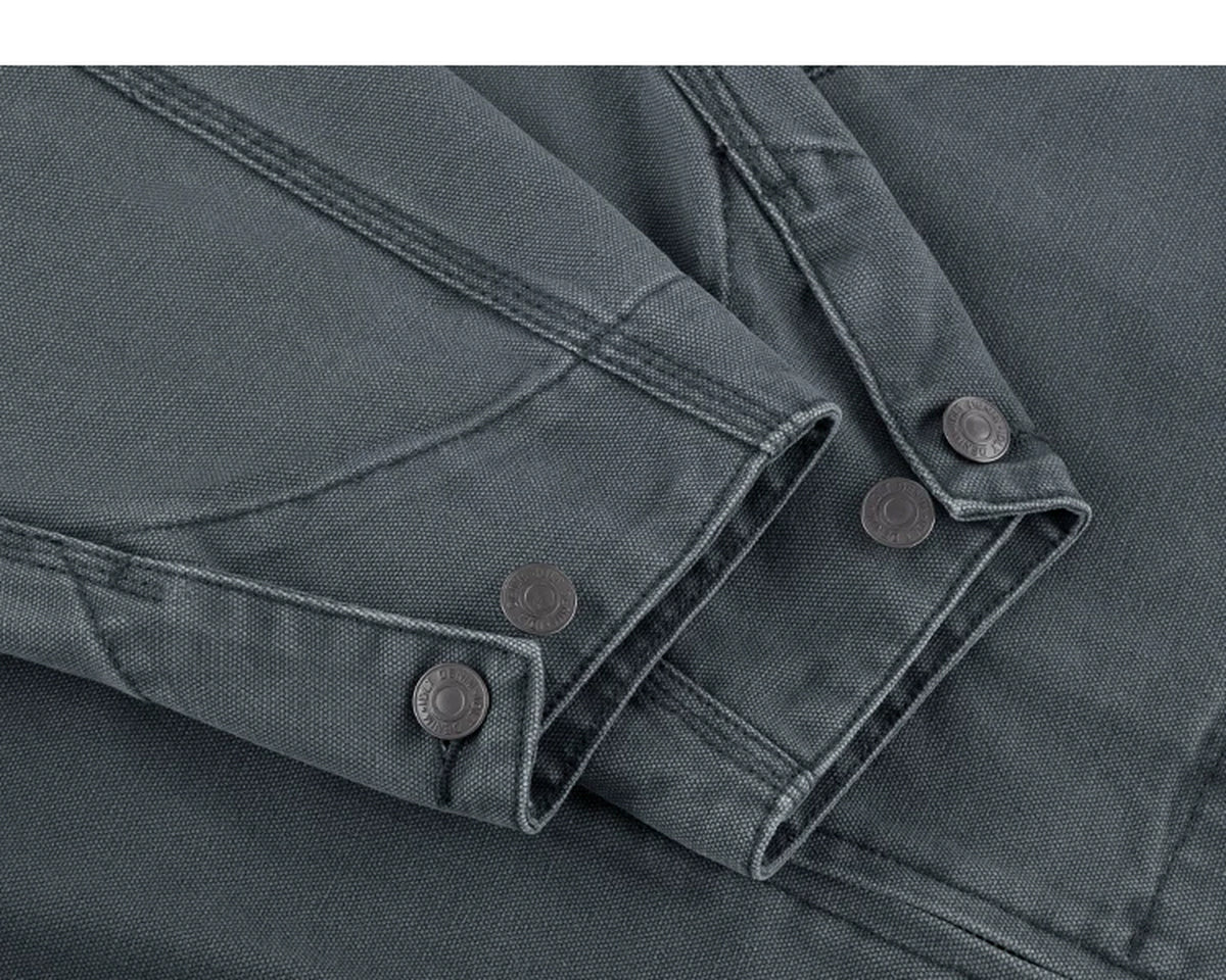 IDLT work jacket, blue gray buttoned cuffs.