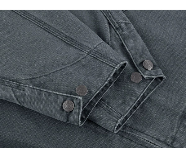 IDLT work jacket, blue gray buttoned cuffs.