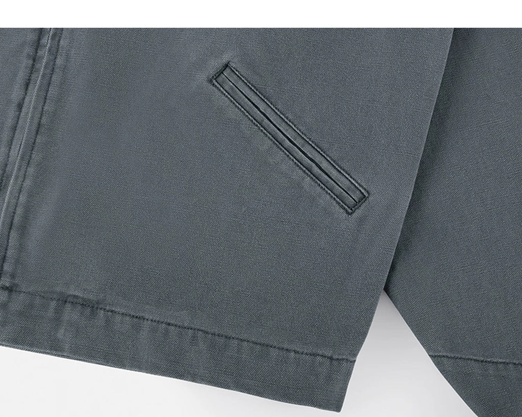 IDLT work jacket, blue gray side pocket.
