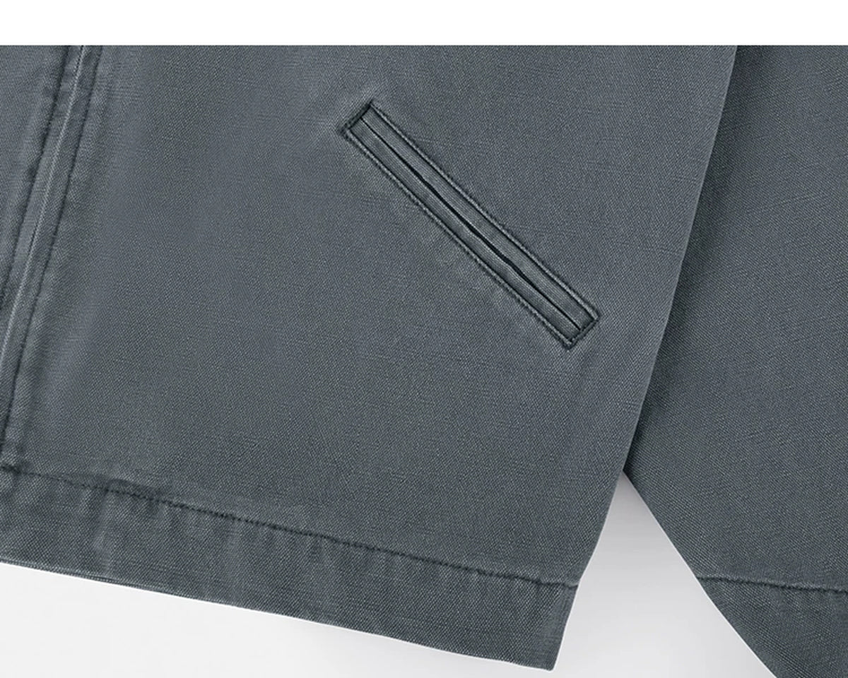 IDLT work jacket, blue gray side pocket.