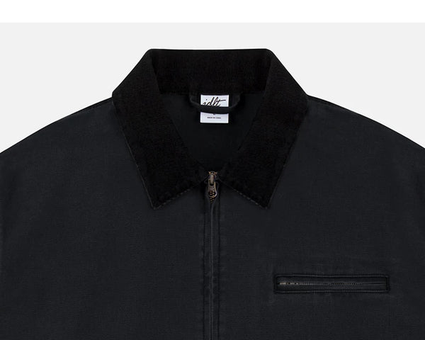 IDLT work jacket, black collar and chest pocket.