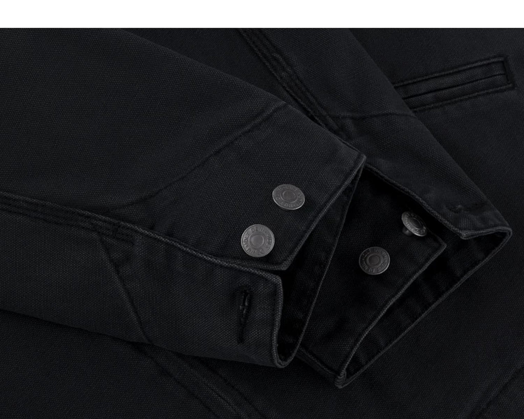 IDLT work jacket, black buttoned cuffs.