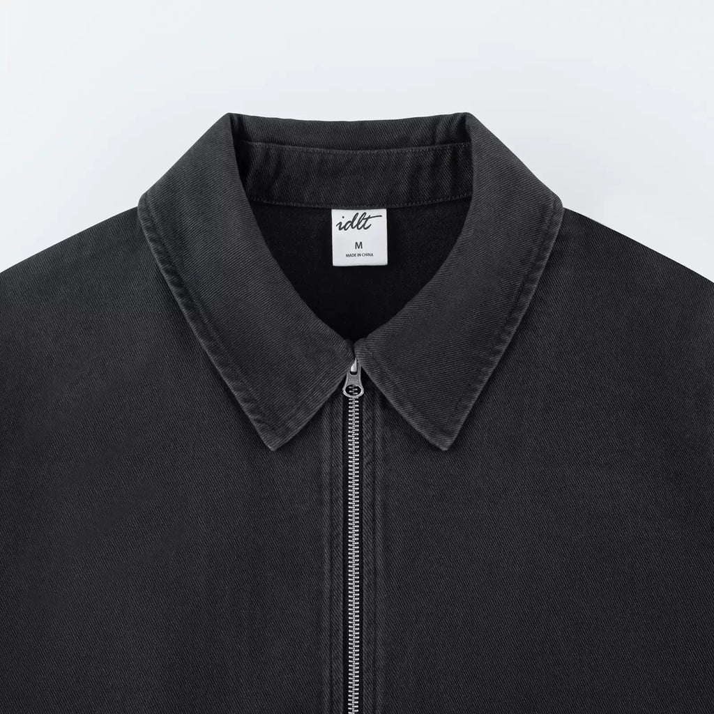 IDLT zip jacket, washed black collar close-up.