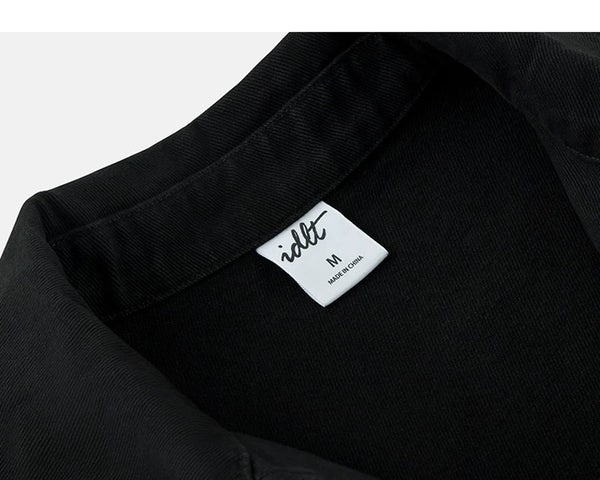 IDLT zip jacket, black neckline label.
